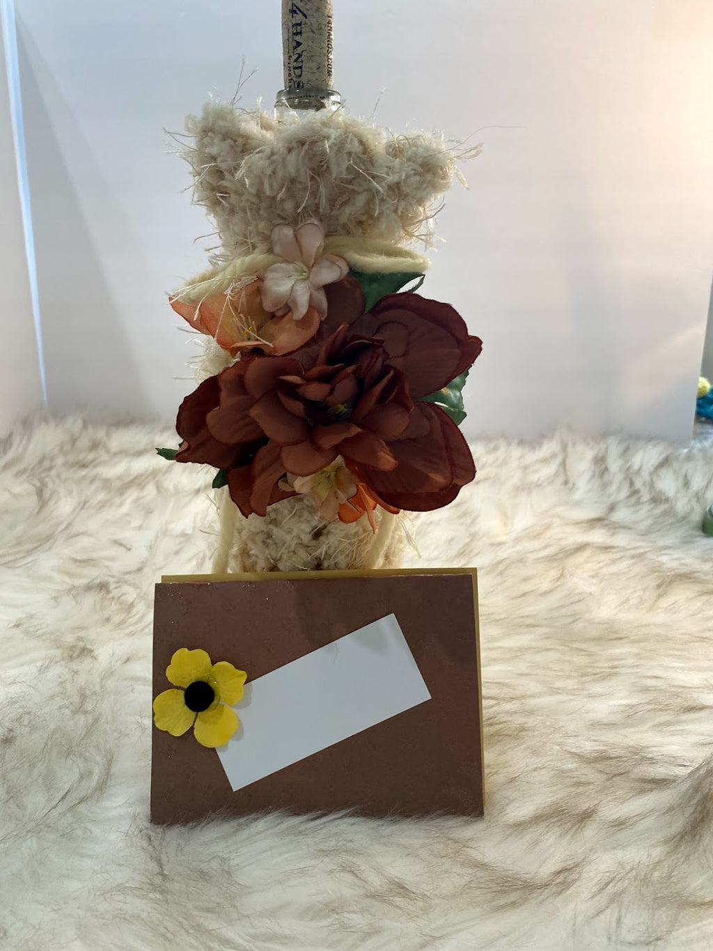 Beige Specialty Yarn Bottle Bag W/Floral Embellishment