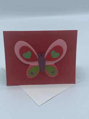 Multi-Colored Wooden Butterfly on Red Card