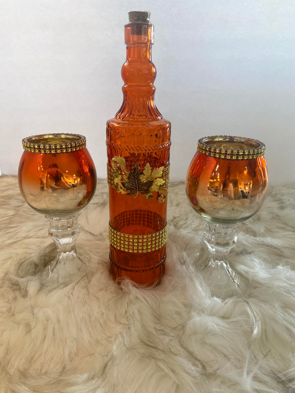 Three Piece Orange Decanter & Candle Glassware Set